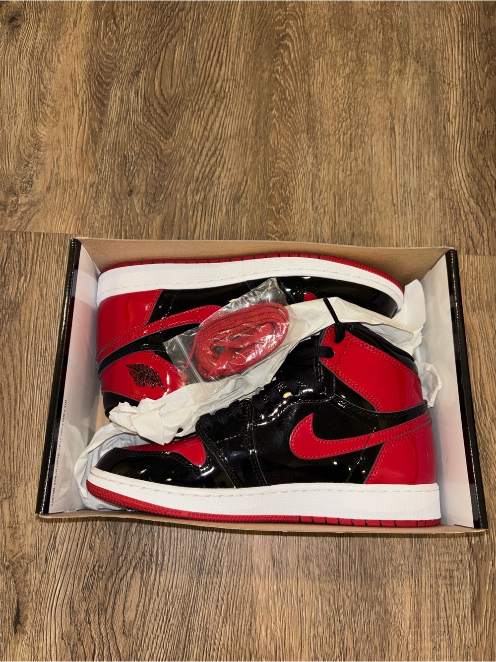 Nike Patent Leather High-Top Sneakers in Red and Black